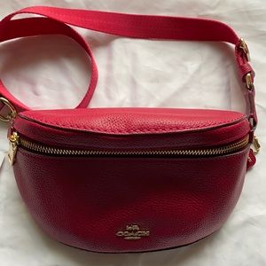 Coach belt bag / crossbody looks red color dark pink